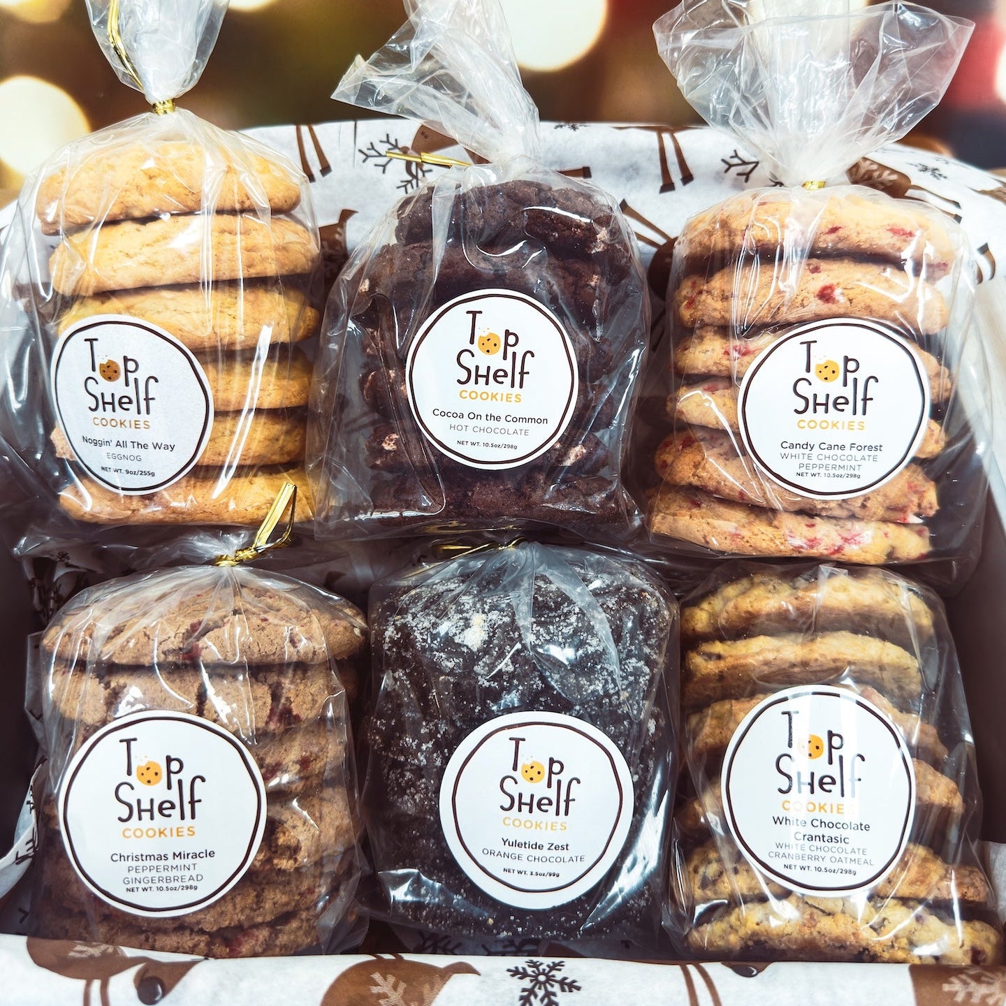 Packaged cookies with 'Top Shelf' labels on a festive background