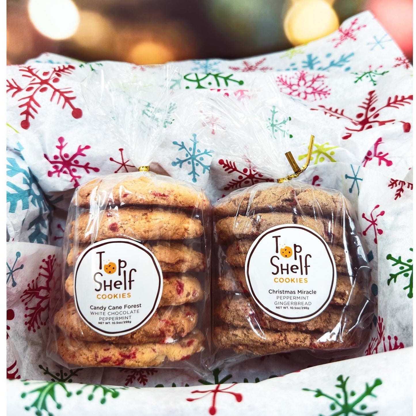 Two packages of cookies with 'Top Shelf' label on a festive background