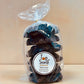 Packaged cookies labeled 'Top Shelf Cookies' with 'Black & Gold' on the label, indicating a dark color theme consistent with the product's name.